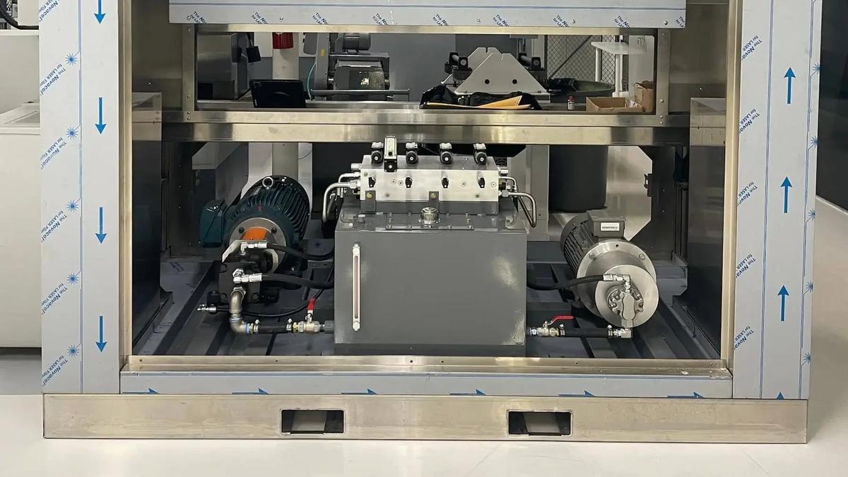 An image showcasing a hydraulic power unit neatly integrated into a test bench, ensuring optimal functionality and space utilization