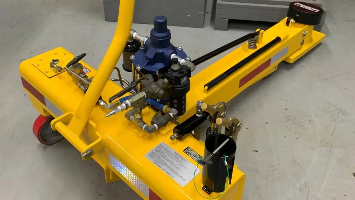 A revamped aviation axle jack, engineered to streamline aircraft maintenance operations through its innovative design and enhanced performance.